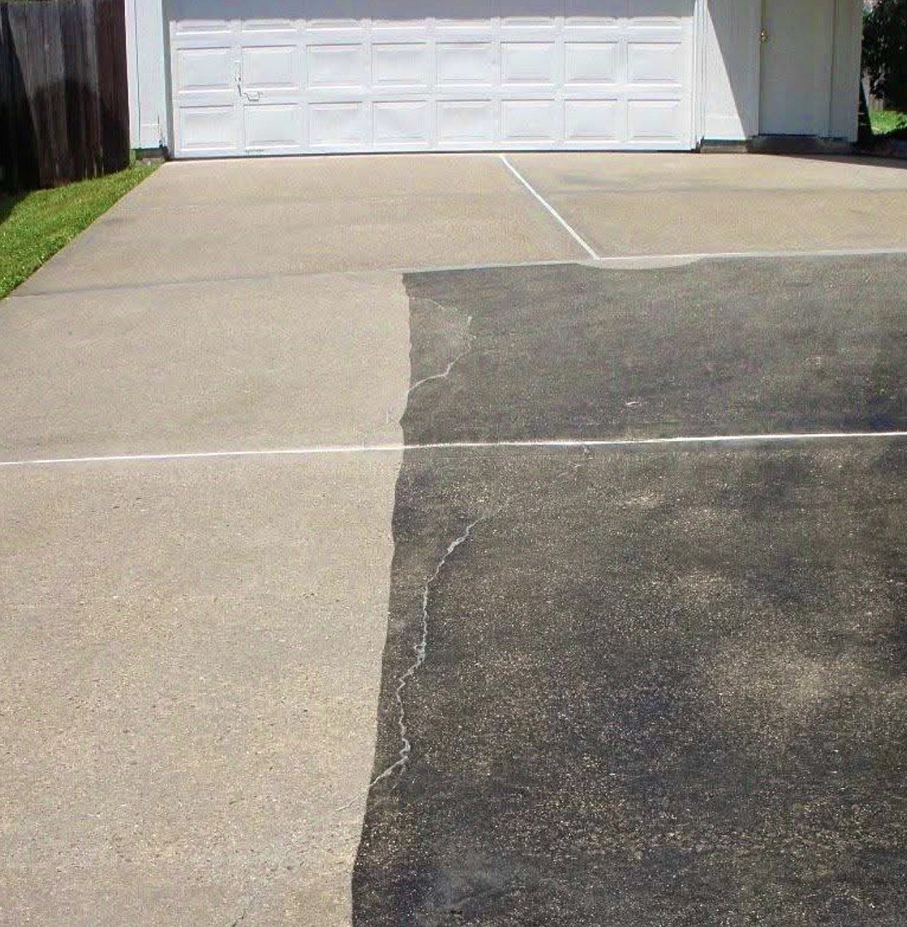 Driveway pressure washing before and after — left side cleaned, right side still dirty